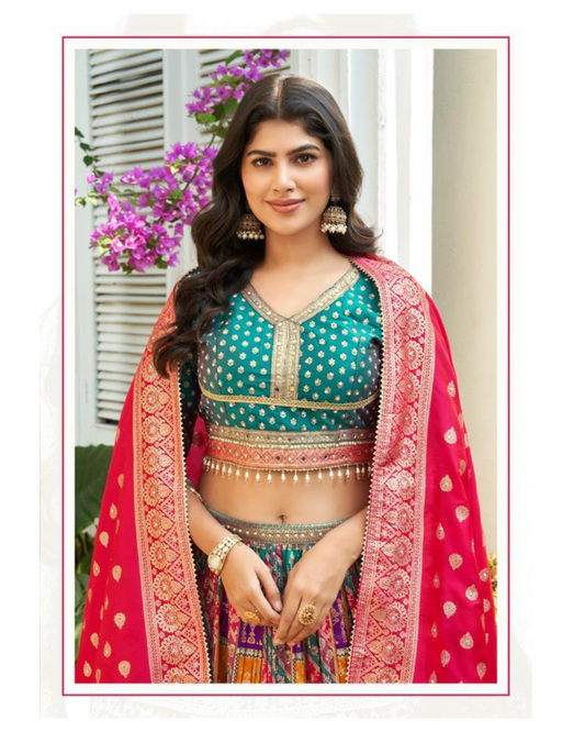 Orange lehenga choli set with rich detailing