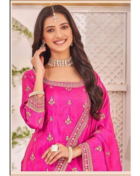 Vibrant Pink Sharara Set with intricate embroidery